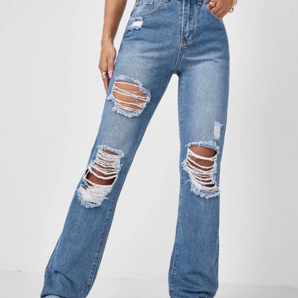 High waist ripped raw hem jeans